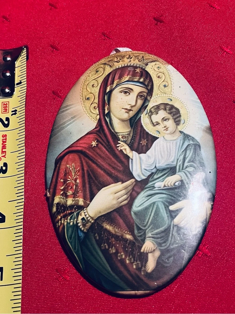 Vintage Eastern Orthodox icon depicting the Virgin Mary holding the Child Jesus